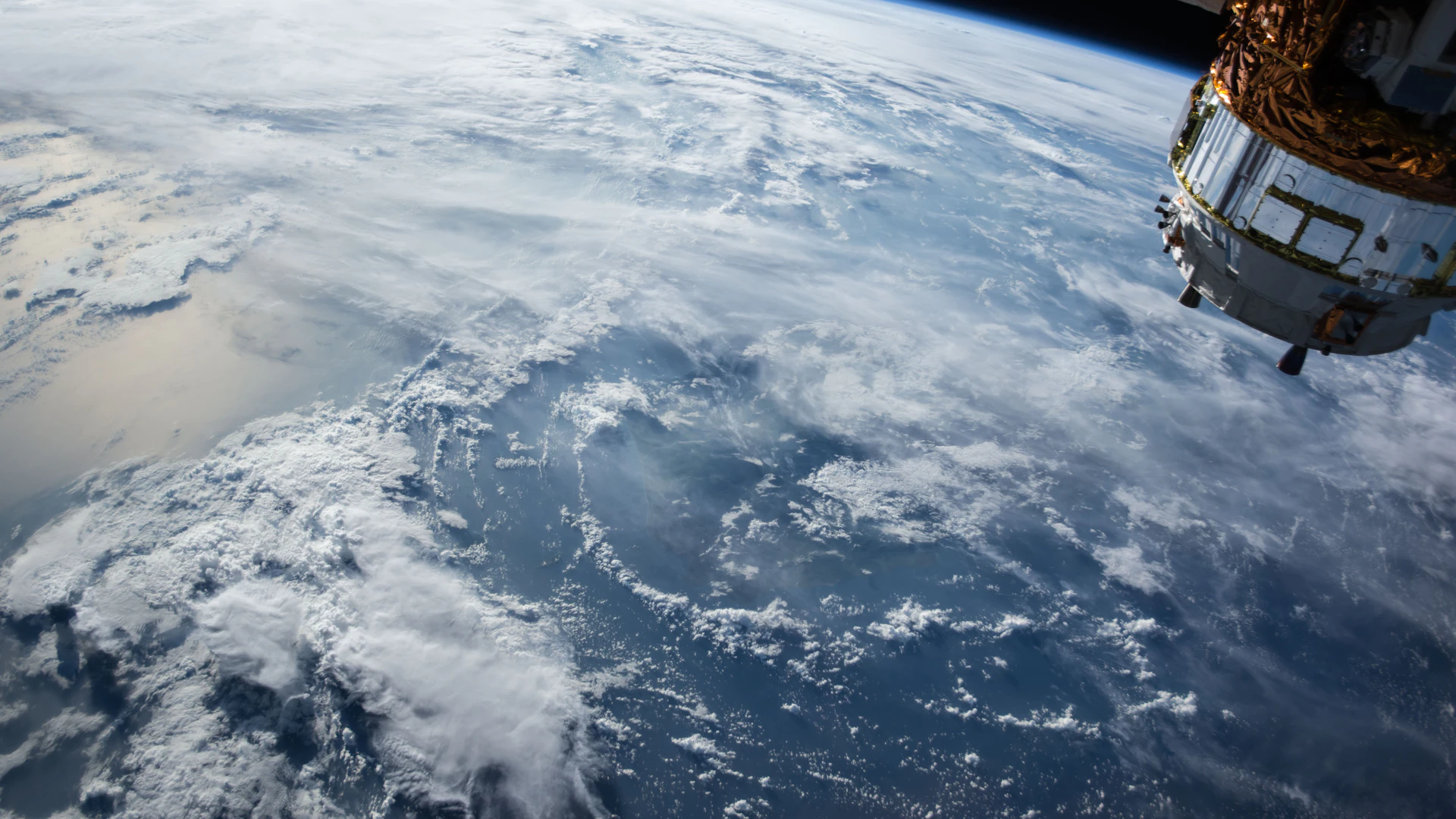Satellite orbiting above planet Earth